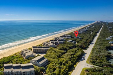 Oceanview condo with peaks of the ocean surrounded by the on The Country Club of the Crystal Coast in North Carolina - for sale on GolfHomes.com, golf home, golf lot