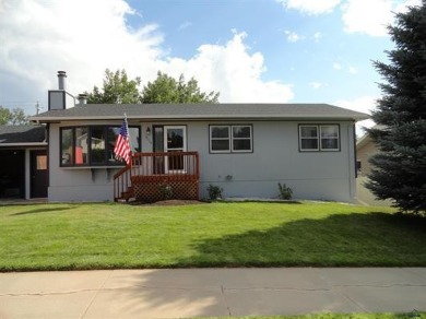 Beautiful 5 bedroom home on the Southwest side with easy access on Arrowhead Country Club in South Dakota - for sale on GolfHomes.com, golf home, golf lot