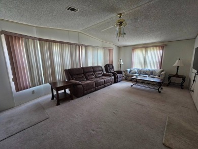 Spanish Village is an affordable housing choice for active on Plantation Golf Club in Florida - for sale on GolfHomes.com, golf home, golf lot