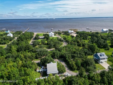 This fantastic lot features numerous adolescent oak trees on The Bridges Golf Club At Hollywood Casino in Mississippi - for sale on GolfHomes.com, golf home, golf lot