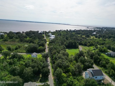 This fantastic lot features numerous adolescent oak trees on The Bridges Golf Club At Hollywood Casino in Mississippi - for sale on GolfHomes.com, golf home, golf lot