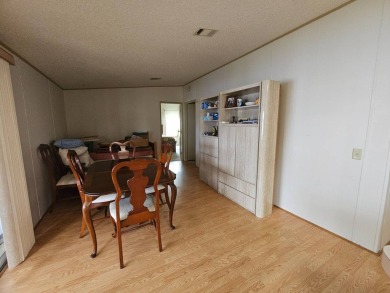 Spanish Village is an affordable housing choice for active on Plantation Golf Club in Florida - for sale on GolfHomes.com, golf home, golf lot