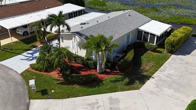 TURN-KEY WATERFRONT HOME UNDER $200K - FULLY RENOVATED WITH NEW on Savanna Golf Club in Florida - for sale on GolfHomes.com, golf home, golf lot