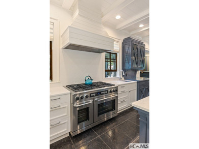 One-of-a-kind property designed by PLATT Architecture and on Mountaintop Golf and Lake Club in North Carolina - for sale on GolfHomes.com, golf home, golf lot