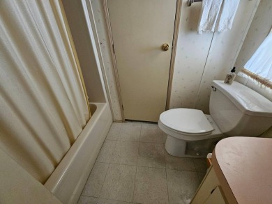 Spanish Village is an affordable housing choice for active on Plantation Golf Club in Florida - for sale on GolfHomes.com, golf home, golf lot