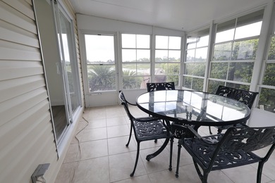 2-YEAR HOME WARRANTY OFFERED AT THE LIST PRICE! Waterfront on Savanna Golf Club in Florida - for sale on GolfHomes.com, golf home, golf lot