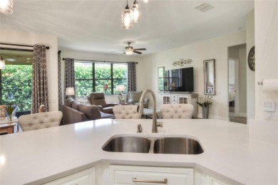 Located in the desirable RESORT-STYLE 55+ community of DEL WEBB on Ridgewood Lakes Golf and Country Club in Florida - for sale on GolfHomes.com, golf home, golf lot