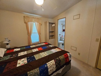 Spanish Village is an affordable housing choice for active on Plantation Golf Club in Florida - for sale on GolfHomes.com, golf home, golf lot