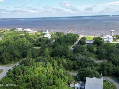 This fantastic lot features numerous adolescent oak trees on The Bridges Golf Club At Hollywood Casino in Mississippi - for sale on GolfHomes.com, golf home, golf lot