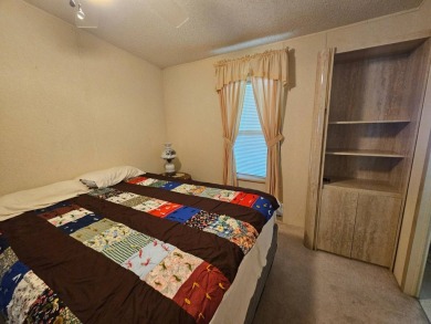 Spanish Village is an affordable housing choice for active on Plantation Golf Club in Florida - for sale on GolfHomes.com, golf home, golf lot