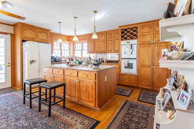 Fabulous Cape Cod style house with detached garaged. This home on Sound Golf Links at Albemarle Plantation in North Carolina - for sale on GolfHomes.com, golf home, golf lot