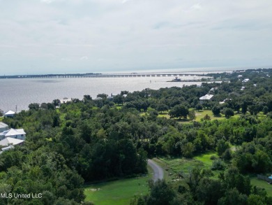 This fantastic lot features numerous adolescent oak trees on The Bridges Golf Club At Hollywood Casino in Mississippi - for sale on GolfHomes.com, golf home, golf lot