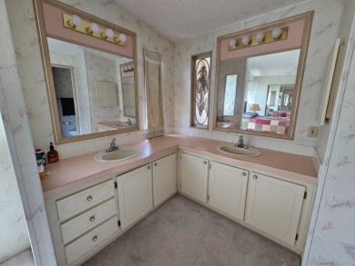 Spanish Village is an affordable housing choice for active on Plantation Golf Club in Florida - for sale on GolfHomes.com, golf home, golf lot