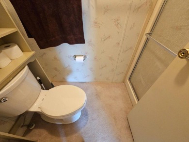 Spanish Village is an affordable housing choice for active on Plantation Golf Club in Florida - for sale on GolfHomes.com, golf home, golf lot