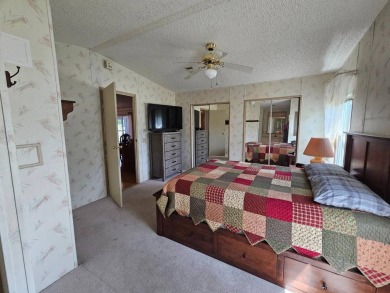 Spanish Village is an affordable housing choice for active on Plantation Golf Club in Florida - for sale on GolfHomes.com, golf home, golf lot