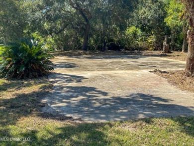 This fantastic lot features numerous adolescent oak trees on The Bridges Golf Club At Hollywood Casino in Mississippi - for sale on GolfHomes.com, golf home, golf lot