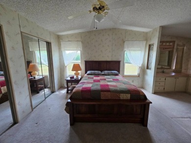 Spanish Village is an affordable housing choice for active on Plantation Golf Club in Florida - for sale on GolfHomes.com, golf home, golf lot