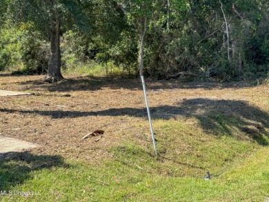This fantastic lot features numerous adolescent oak trees on The Bridges Golf Club At Hollywood Casino in Mississippi - for sale on GolfHomes.com, golf home, golf lot