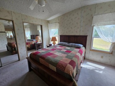 Spanish Village is an affordable housing choice for active on Plantation Golf Club in Florida - for sale on GolfHomes.com, golf home, golf lot