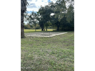 This fantastic lot features numerous adolescent oak trees on The Bridges Golf Club At Hollywood Casino in Mississippi - for sale on GolfHomes.com, golf home, golf lot