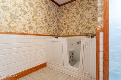 Fabulous Cape Cod style house with detached garaged. This home on Sound Golf Links at Albemarle Plantation in North Carolina - for sale on GolfHomes.com, golf home, golf lot