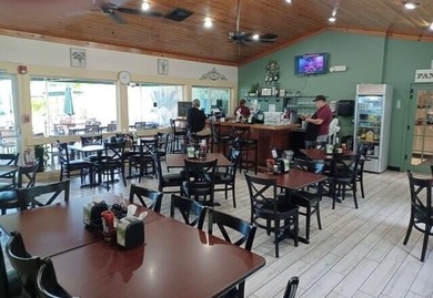 2-Year Home Warranty Included - Fully Renovated Waterfront Home on Savanna Golf Club in Florida - for sale on GolfHomes.com, golf home, golf lot