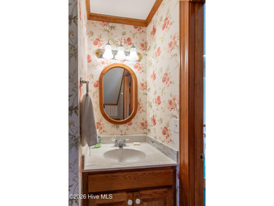 Fabulous Cape Cod style house with detached garaged. This home on Sound Golf Links at Albemarle Plantation in North Carolina - for sale on GolfHomes.com, golf home, golf lot