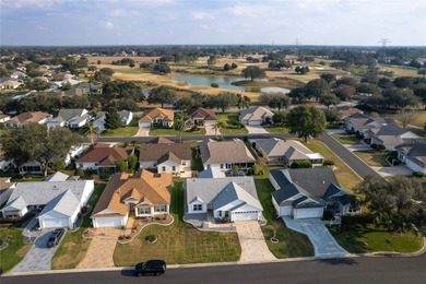 BOND PAID! This beautifully maintained 3-bedroom, 2-bath home is on Nancy Lopez Legacy Golf and Country Club in Florida - for sale on GolfHomes.com, golf home, golf lot