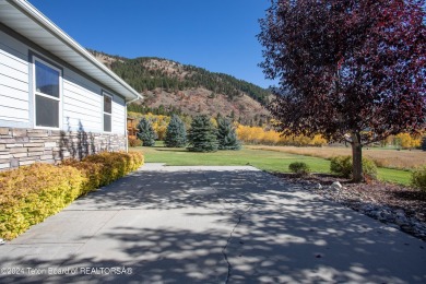 Experience unparalleled luxury living in this custom 4300 sq ft on Cedar Creek Golf Course in Wyoming - for sale on GolfHomes.com, golf home, golf lot