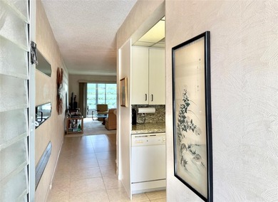 ACTIVE 55+ community! Bright 2nd floor home w/pool view. Receive on Wynmoor Golf Course in Florida - for sale on GolfHomes.com, golf home, golf lot