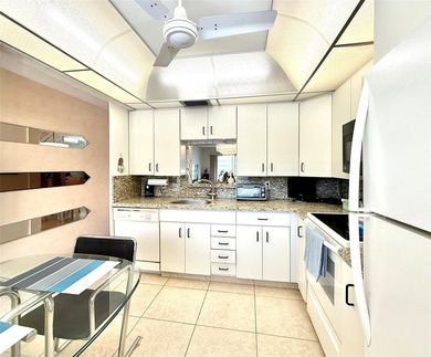 ACTIVE 55+ community! Bright 2nd floor home w/pool view. Receive on Wynmoor Golf Course in Florida - for sale on GolfHomes.com, golf home, golf lot