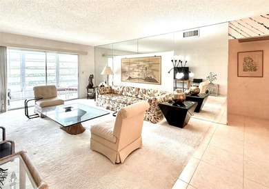 ACTIVE 55+ community! Bright 2nd floor home w/pool view. Receive on Wynmoor Golf Course in Florida - for sale on GolfHomes.com, golf home, golf lot