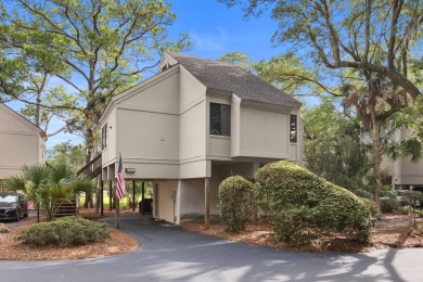 Overlooking the ever-changing tidal marsh, this charming on The Seabrook Island Club in South Carolina - for sale on GolfHomes.com, golf home, golf lot