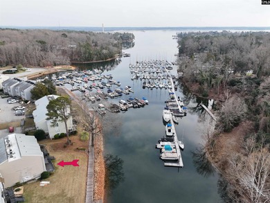 LAKE LIFE Living without the big Lake Life Price.  This newly on Club At Rawls Creek in South Carolina - for sale on GolfHomes.com, golf home, golf lot
