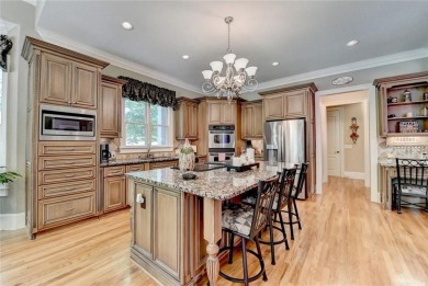 Discover the ultimate in upscale living in one of the area's on Royal Lakes Golf and Country Club in Georgia - for sale on GolfHomes.com, golf home, golf lot