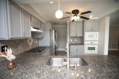 LAKE LIFE Living without the big Lake Life Price.  This newly on Club At Rawls Creek in South Carolina - for sale on GolfHomes.com, golf home, golf lot