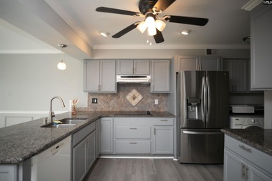 LAKE LIFE Living without the big Lake Life Price.  This newly on Club At Rawls Creek in South Carolina - for sale on GolfHomes.com, golf home, golf lot