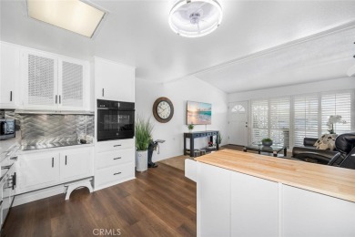 Charming 1-bedroom with unique vibe in prime drive-up location on Leisure World Seal Beach Golf Course in California - for sale on GolfHomes.com, golf home, golf lot