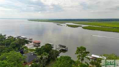 Discover Luxury Living in this 5 Bedroom 3 full & 3 1/2 Bath on Sapelo Hammock Golf Club in Georgia - for sale on GolfHomes.com, golf home, golf lot