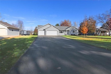 Nestled just a stones throw away from the beauty and serenity of on Oak Hill Golf Club in Minnesota - for sale on GolfHomes.com, golf home, golf lot