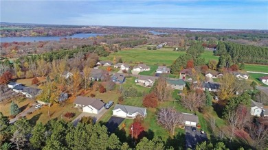 Nestled just a stones throw away from the beauty and serenity of on Oak Hill Golf Club in Minnesota - for sale on GolfHomes.com, golf home, golf lot