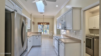 GORGEOUS GOLF COURSE HOME SITTING ON THE 6TH FAIRWAY IN HIGHLY on Halifax Plantation Golf Club in Florida - for sale on GolfHomes.com, golf home, golf lot