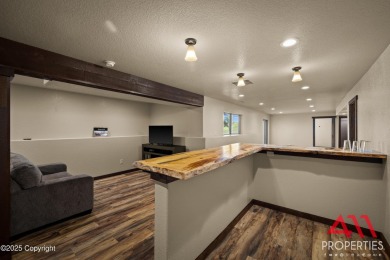 Modern elegance meets prime golf course living at 205 Mountain on Bell Nob Golf Course in Wyoming - for sale on GolfHomes.com, golf home, golf lot