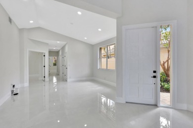 This totally renovated open concept Cambridge Villa in Wycliffe on Wycliffe Golf and Country Club in Florida - for sale on GolfHomes.com, golf home, golf lot