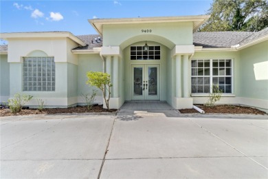 Welcome to your dream retreat in the gated Glen Lakes golf on Glen Lakes Country Club in Florida - for sale on GolfHomes.com, golf home, golf lot
