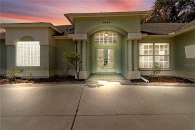 Welcome to your dream retreat in the gated Glen Lakes golf on Glen Lakes Country Club in Florida - for sale on GolfHomes.com, golf home, golf lot