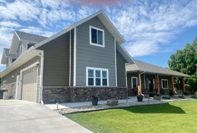 This gorgeous 5 bedroom, 3 bath home in The Powder Horn Golf on The Powder Horn Golf Club - Mountain in Wyoming - for sale on GolfHomes.com, golf home, golf lot