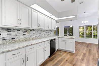 Welcome to your dream retreat in the gated Glen Lakes golf on Glen Lakes Country Club in Florida - for sale on GolfHomes.com, golf home, golf lot
