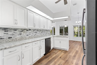 Welcome to your dream retreat in the gated Glen Lakes golf on Glen Lakes Country Club in Florida - for sale on GolfHomes.com, golf home, golf lot