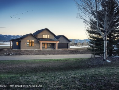 Exquisite construction located along the fairway of the 4th hole on Headwaters Club At Teton Springs in Idaho - for sale on GolfHomes.com, golf home, golf lot